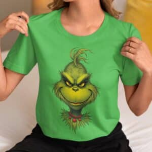 Women's Holiday T-Shirt with Unique Christmas Grinch Design.