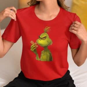 Women's Holiday T-Shirt with Unique Christmas Grinch Eating Gingerbread Design,