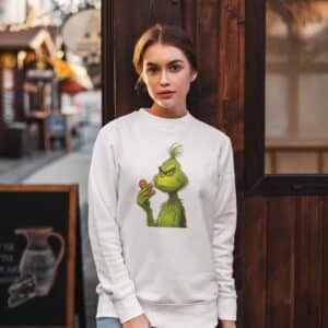 Women's Festive Christmas Sweatshirt - Unique Holiday Print, Grinch Eating Gingerbread Design