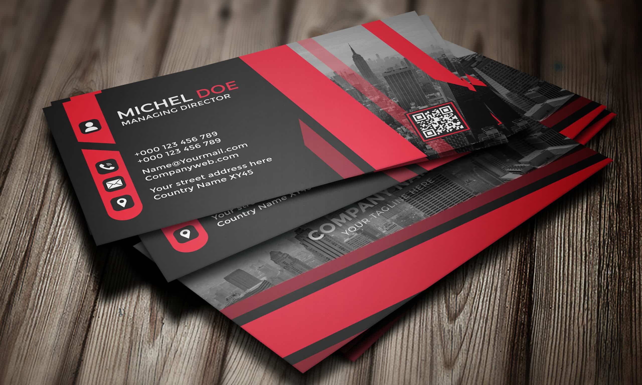 Custom business cards featuring a modern design with red and black color scheme, showcasing contact details, a QR code, and a city skyline background, emphasizing professional branding for users seeking custom business card solutions.